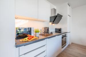 Η κουζίνα ή μικρή κουζίνα στο Villa 15 Appartement Ankerplatz 1