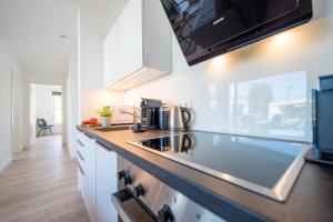 Η κουζίνα ή μικρή κουζίνα στο Villa 15 Appartement Ankerplatz 1