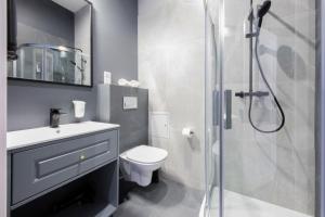 Kúpeľňa v ubytovaní Aparthotel Cracovia Residence
