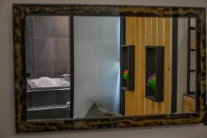 Postel nebo postele na pokoji v ubytování Platinum Suites