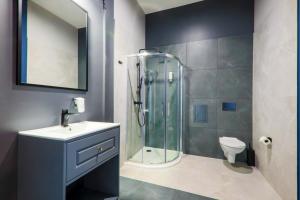 Kúpeľňa v ubytovaní Aparthotel Cracovia Residence