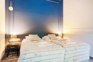 Posteľ alebo postele v izbe v ubytovaní Aparthotel Cracovia Residence