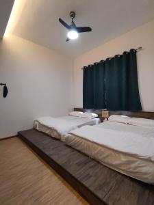 Ліжко або ліжка в номері Cameron Lovely Cottage 3 Rooms