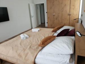 Posteľ alebo postele v izbe v ubytovaní Apartament Zimowiec