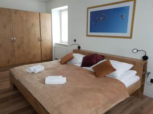 Posteľ alebo postele v izbe v ubytovaní Apartament Zimowiec