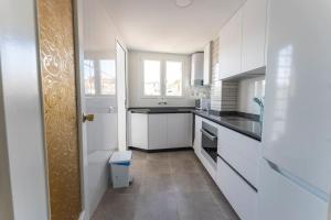 Kuchyňa alebo kuchynka v ubytovaní Precioso apartamento en altura