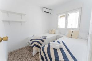 Posteľ alebo postele v izbe v ubytovaní Precioso apartamento en altura