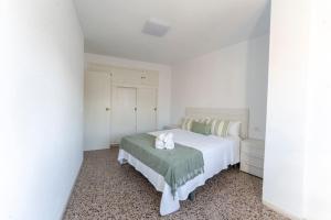 Posteľ alebo postele v izbe v ubytovaní Precioso apartamento en altura