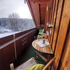 Balkón nebo terasa v ubytování Ferienwohnung Holzmaier