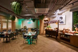 曼谷盛捷拉玛9服务公寓餐厅或其他用餐的地方