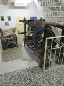 a pile of equipment in a room with a staircase at Antichi Sapori da Speranza in Gavoi