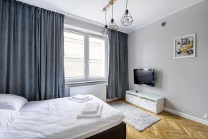 Fotografia z galérie ubytovania KING APART Dickensa vo Varšave + 4 fotografie
