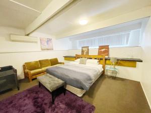 Katil atau katil-katil dalam bilik di Mountain Top kiwi star holiday home
