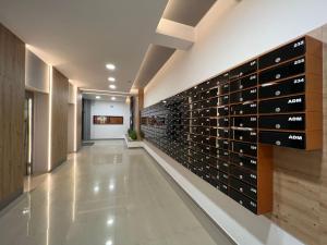a wine cellar with a wall of wine bottles at Perfect Host Palas in Iaşi