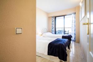 Posteľ alebo postele v izbe v ubytovaní ESPACIO 5 - Primera Línea de Playa