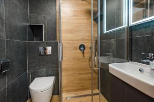 Kúpeľňa v ubytovaní Apartamenty na Uroczysku
