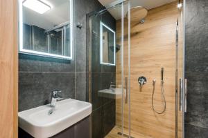 Kúpeľňa v ubytovaní Apartamenty na Uroczysku