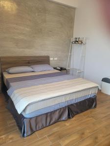 Lova arba lovos apgyvendinimo įstaigoje Stone Spring B&B