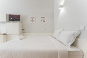 Postel nebo postele na pokoji v ubytování GuestReady - San Sebastian Studio 1