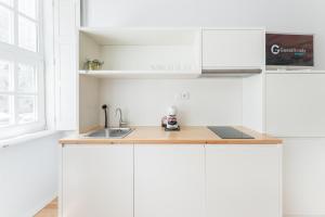 Kuchyň nebo kuchyňský kout v ubytování GuestReady - San Sebastian Studio 1