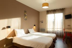 Postel nebo postele na pokoji v ubytování Auberge de jeunesse HI Bordeaux-Blanquefort - Ex Otellia + 7 fotografií