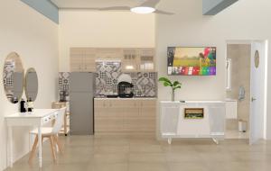 a white kitchen with a sink and a counter at Mpitzarakis Studio On the Beach in Agia Pelagia