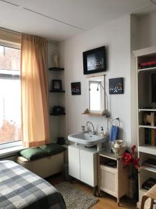 Ένα ή περισσότερα κρεβάτια σε δωμάτιο στο Six +11 φωτογραφίες