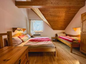 Postel nebo postele na pokoji v ubytování Apartmán 339 - Tatralandia