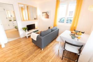 Posedenie v ubytovaní Appartement T2 neuf, cosy & tout confort - Proche Centre ville par Groom