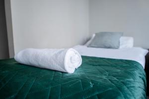 Postel nebo postele na pokoji v ubytování Hotel Felix