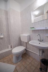 Koupelna v ubytování Hotel Felix