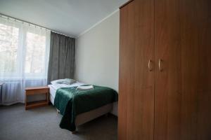 Postel nebo postele na pokoji v ubytování Hotel Felix