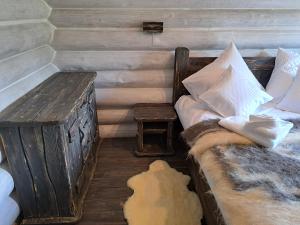Posteľ alebo postele v izbe v ubytovaní Mountain White House гостинний двір