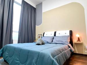 Postel nebo postele na pokoji v ubytování The D Carlton HomeStay 2BR + 26 fotografií