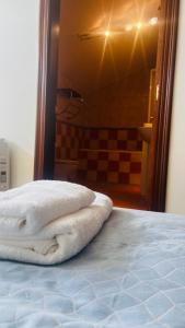 Postel nebo postele na pokoji v ubytování Casa Simona