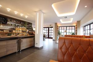 Posezení v ubytování zeitlos Hotel und Restaurant am Fuchsbach