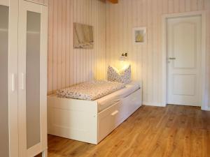 Postel nebo postele na pokoji v ubytování Apartments im Schwedenstil