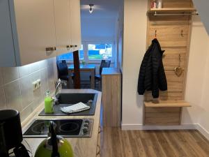 Kuchyň nebo kuchyňský kout v ubytování Ferienwohnung 3 ADA