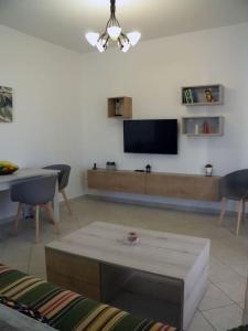 A television and/or entertainment centre at Casa Karavola in Galanado village-Naxos