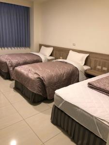 Letto o letti in una camera di Lohas Seaview B&B