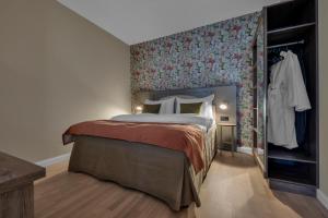 Postel nebo postele na pokoji v ubytování Home Hotel Gabelshus