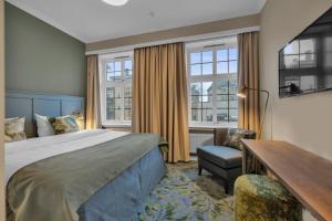 Postel nebo postele na pokoji v ubytování Home Hotel Gabelshus