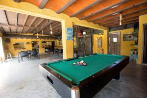 a pool table in the middle of a room at Catalunya Casas Relax and Recharge - only 34km from Barcelona! in Rubí