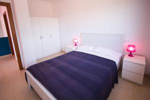 A bed or beds in a room at Catalunya Casas Fun and Frolic in Lloret del Mar 3500 meters to beach!