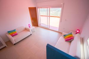 A bed or beds in a room at Catalunya Casas Fun and Frolic in Lloret del Mar 3500 meters to beach!