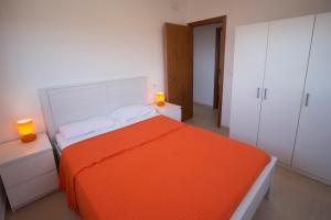 A bed or beds in a room at Catalunya Casas Fun and Frolic in Lloret del Mar 3500 meters to beach!