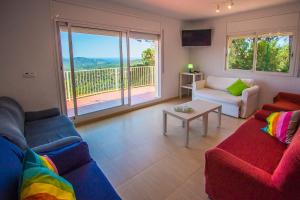 A seating area at Catalunya Casas Fun and Frolic in Lloret del Mar 3500 meters to beach!
