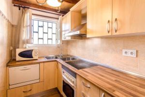 A kitchen or kitchenette at Catalunya Casas Costa Brava villa with private pool & spacious garden