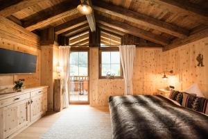 Łóżko lub łóżka w pokoju w obiekcie Gletscher-Chalet Stubai