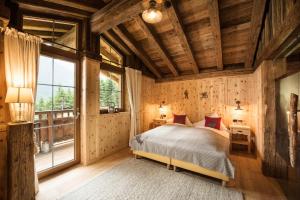 Łóżko lub łóżka w pokoju w obiekcie Gletscher-Chalet Stubai